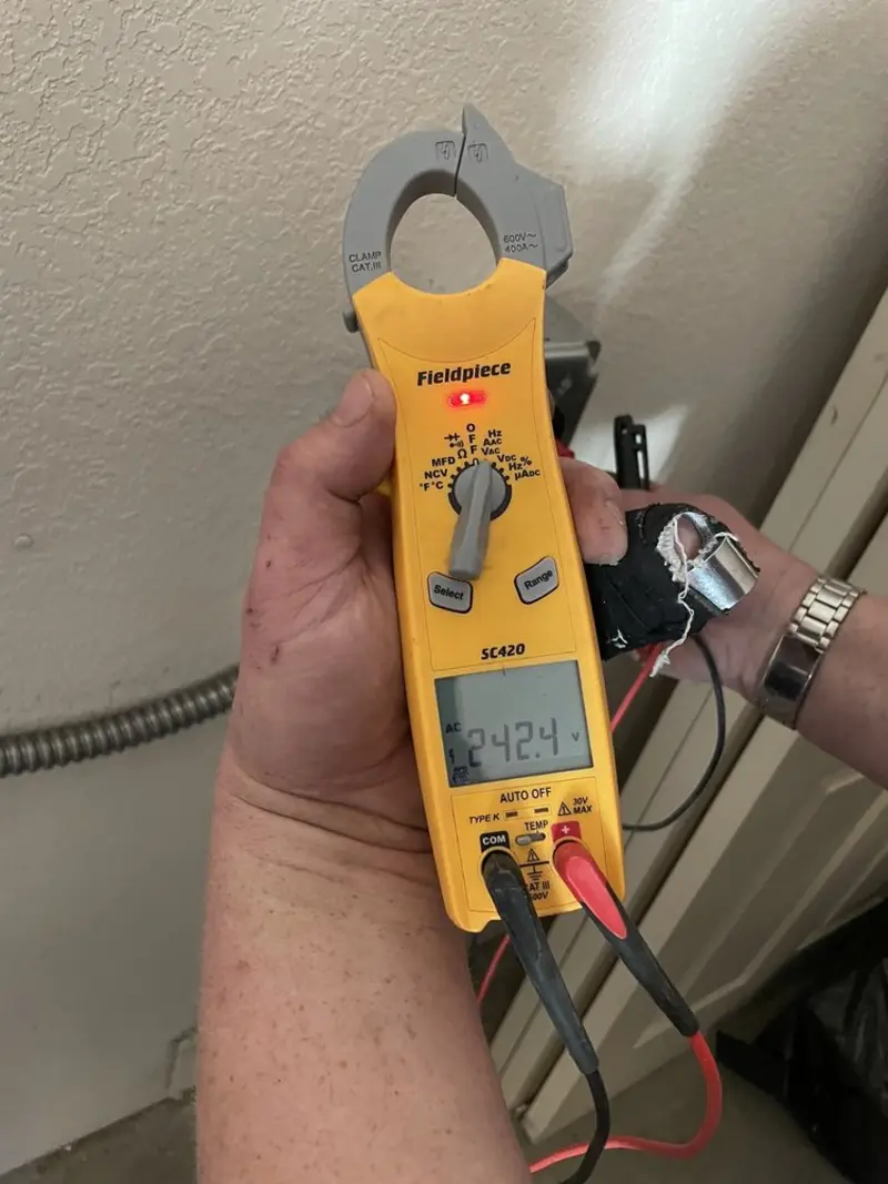 Voltage testing with clamp meter during Circuit Breaker Repair in Bermuda Run